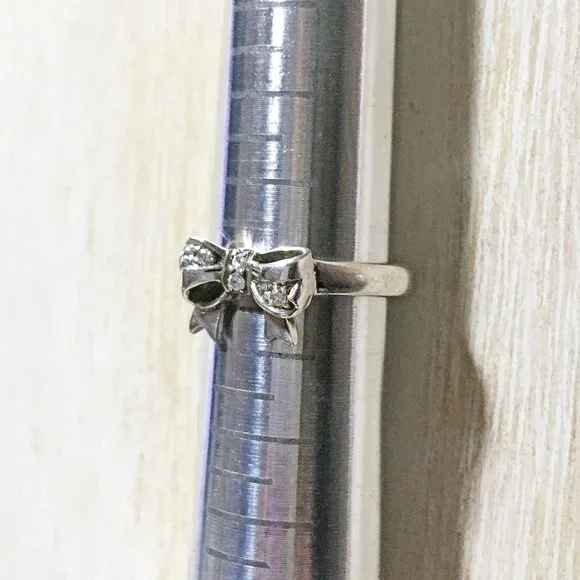 AUTHENTIC BLOOM NYC STERLING SILVER DAINTY BOW & CZ ACCENT BAND RING SIZE: 7 - Picture 8 of 10